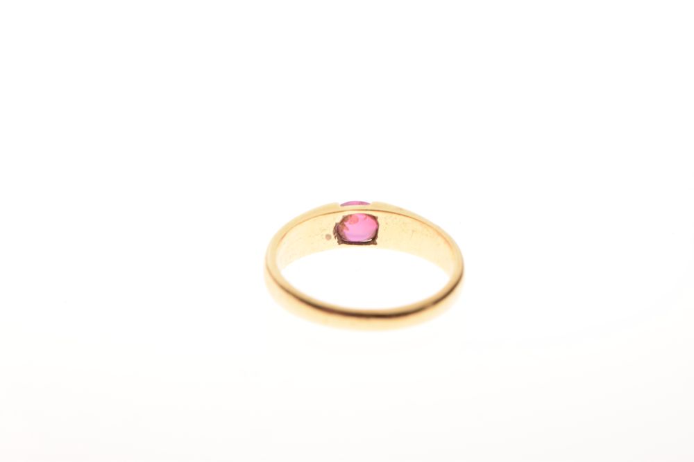 Yellow metal dress ring, the plain band set pink oval cabochon, shank stamped 18k, size Q½, 5.4g - Image 3 of 5