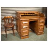 Early 29th Century oak tambour top twin pedestal desk, 98cm x 107cm x 66.5cm approx, together with a
