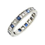 9ct white gold eternity ring set alternating white and blue stones, size K½, 2.6g gross approx