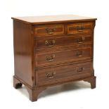 Late 20th Century reproduction mahogany chest of drawers having two short over three long drawers,