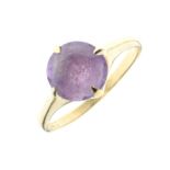 9ct gold ring set central purple stone, size N, 2.7g gross approx Condition: Some light surface wear