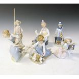 Five Lladro porcelain figures, together with 'The Leonardo Collection' clown riding a train