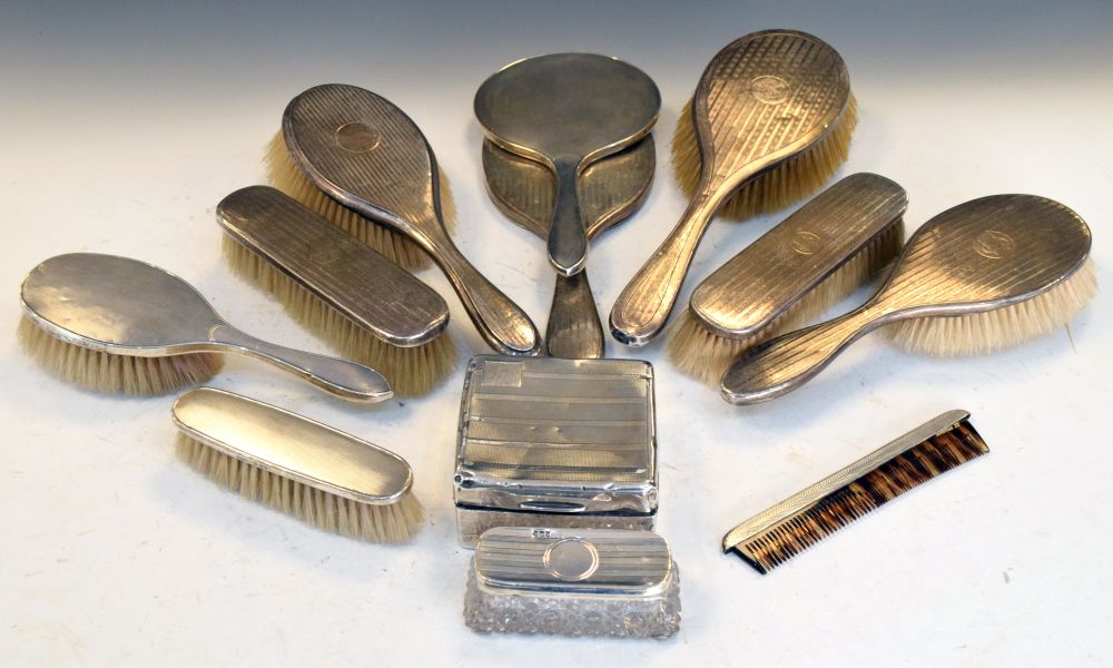 Quantity of mid 20th Century silver backed brushes and mirrors, etc Condition: Items from various