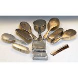 Quantity of mid 20th Century silver backed brushes and mirrors, etc Condition: Items from various