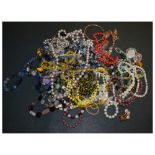 Assorted costume jewellery to include bead necklaces, bangle etc Condition: Group lot, sold as seen.