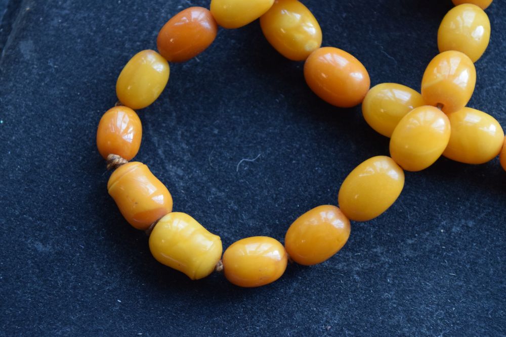 Graduated string of amber beads, 84cm long approx, 52g approx Condition: **Due to current lockdown - Image 3 of 8