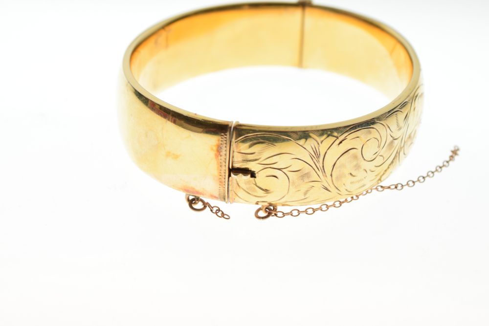 Yellow metal snap bangle, stamped 9ct metal core, 16mm wide, 30.7g gross approx Condition: ** Due to - Image 5 of 7