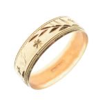 Gentleman's 9ct gold wedding band with engraved exterior, inscribed 'Love', approximately 6mm