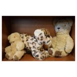 Steiff plush leopard cub, together with musical plush bear and another Condition: Leopard cub