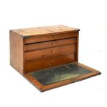 Early 20th Century oak four-drawer tool chest with fall front, 59cm wide Condition: General scuffing