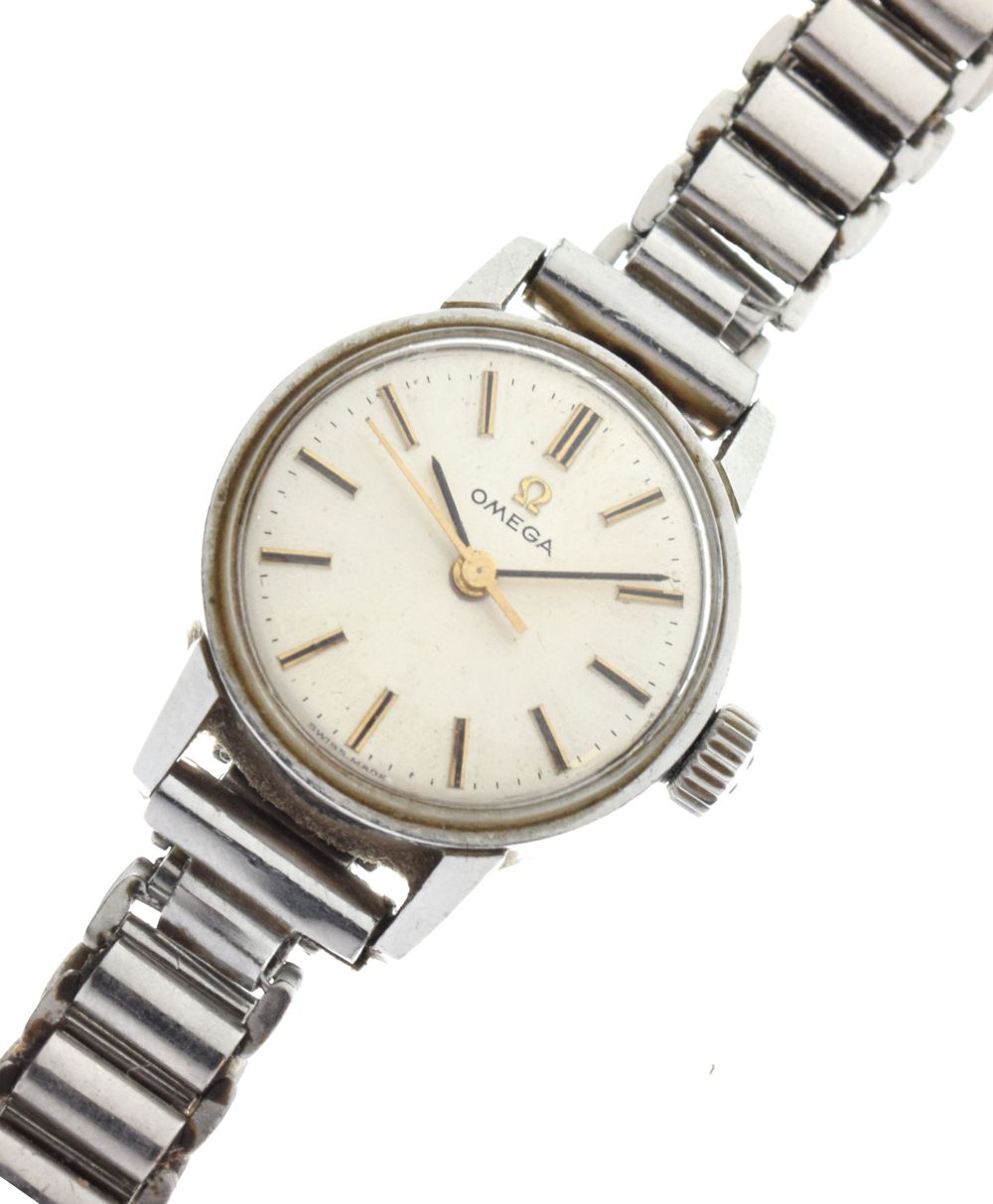 Omega - Lady's stainless steel wristwatch, silvered dial with baton hour markers and centre seconds,