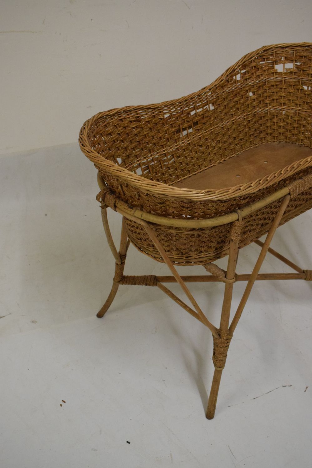 Bamboo and wicker cradle or bassinet, 88cm long x 78cm high Condition: Woodworm to the frame and - Image 3 of 5