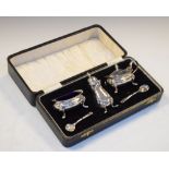 Elizabeth II cased three piece silver condiment set, Birmingham 1964, 130g approx Condition: Some