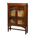 Early 20th Century oak bookcase on stand, 97cm x 26.5cm x 145cm high Condition: Loss to left hand