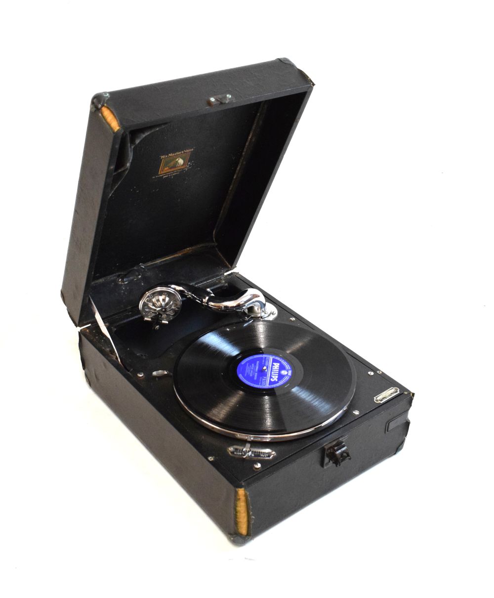 HMV table top record player Condition: General wear to corners of both cover and body, for