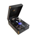 HMV table top record player Condition: General wear to corners of both cover and body, for