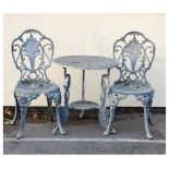 Modern aluminium three piece patio set comprising: two chairs and table, each with floral decoration