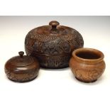 Treen - African hardwood circular covered box with turned handle, the exterior with decorative
