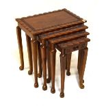 Nest of four Eastern hardwood rectangular occasional tables, 46cm wide Condition: Slight wear. **Due