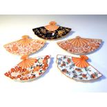 Five Japanese fan dishes, all having typical decoration, 26cm wide approx Condition: Some loss of