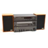 NAD Hi-Fi system comprising Series 20 stereo amplifier 3020, stereo tuner 4020A, and CD player 5320,