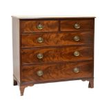 19th Century mahogany chest of two and three long drawers with brass oval handles, raised on bracket