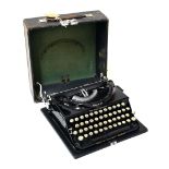 Imperial typewriter, cased, 30cm wide Condition: The case is rather worn but the typewriter itself
