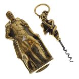 Cast brass door knocker modelled as a Saxon warrior, together with a brass corkscrew modelled as