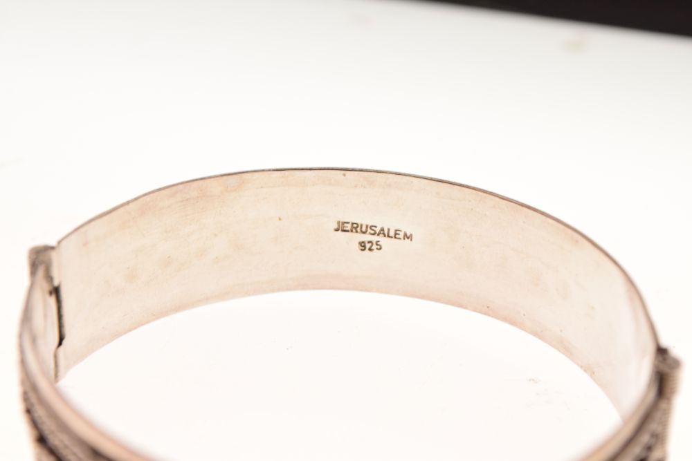 Judaica - Israeli white metal snap bangle stamped Jerusalem 925, the exterior with berry cluster and - Image 6 of 6