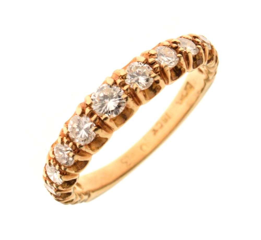 Yellow metal and fifteen stone diamond ring, shank stamped 18ct, size L, 2.6g gross approx