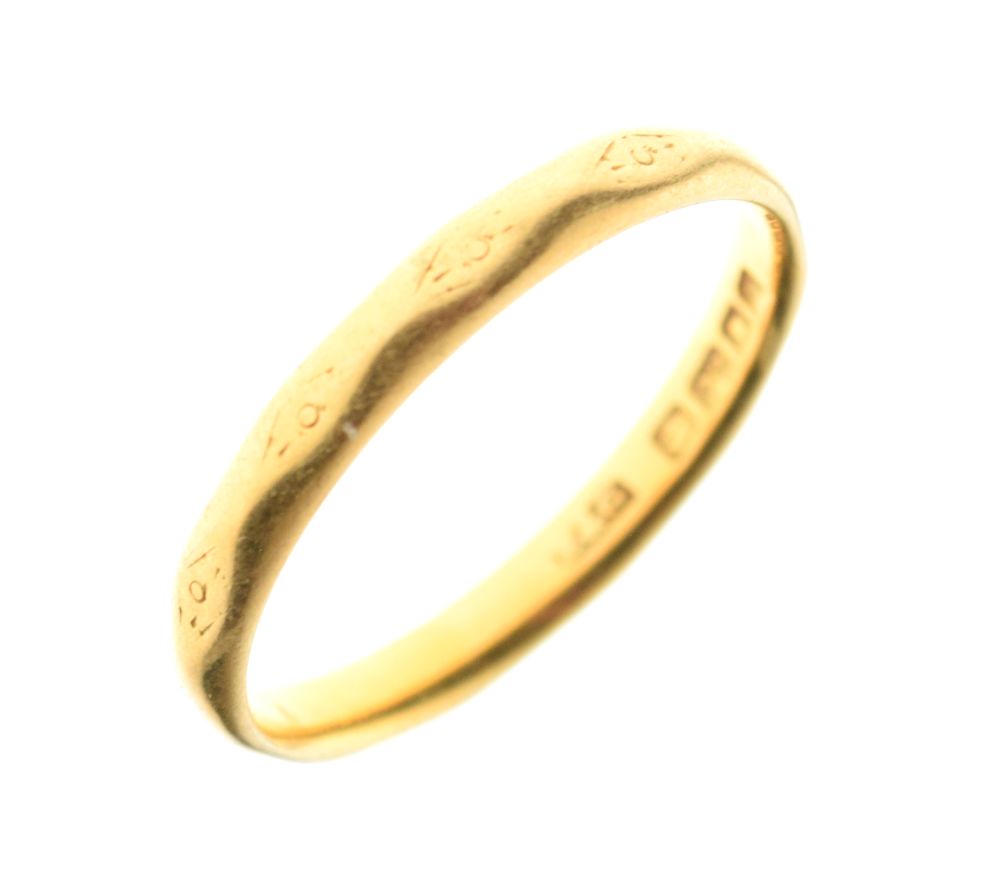 22ct gold wedding band, size O, 2.7g approx Condition: general wear to external engraving, otherwise