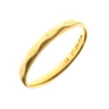 22ct gold wedding band, size O, 2.7g approx Condition: general wear to external engraving, otherwise