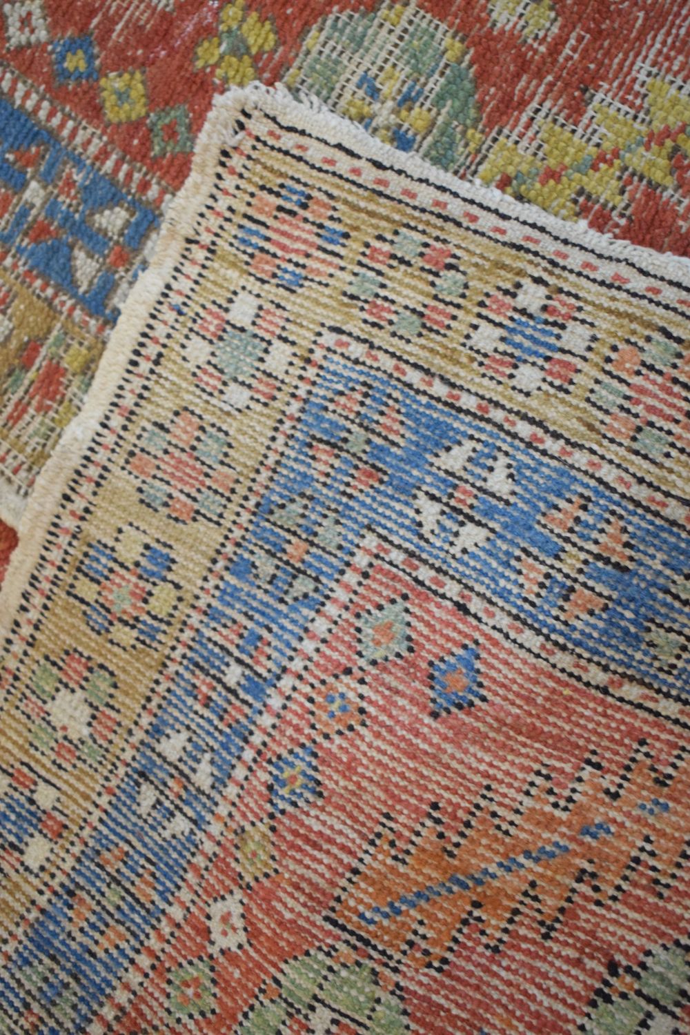 Early to mid 20th Century Caucasian wool runner, the brick-red field with flowering plant motif - Image 5 of 5