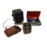 Four various cameras including Agfa Flexilette dual lens camera, a box camera etc Condition: Refer