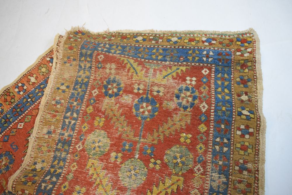 Early to mid 20th Century Caucasian wool runner, the brick-red field with flowering plant motif - Image 3 of 5