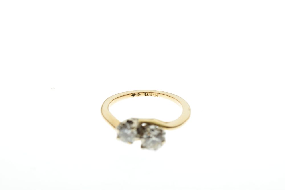 Yellow metal and two stone diamond ring of crossover design, shank stamped 18ct, the stones - Image 5 of 5