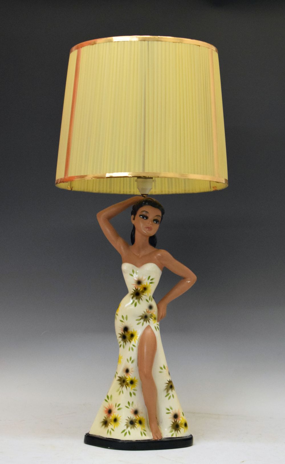 Mid 20th Century plaster figural table lamp formed as a female in a white floral dress, vintage