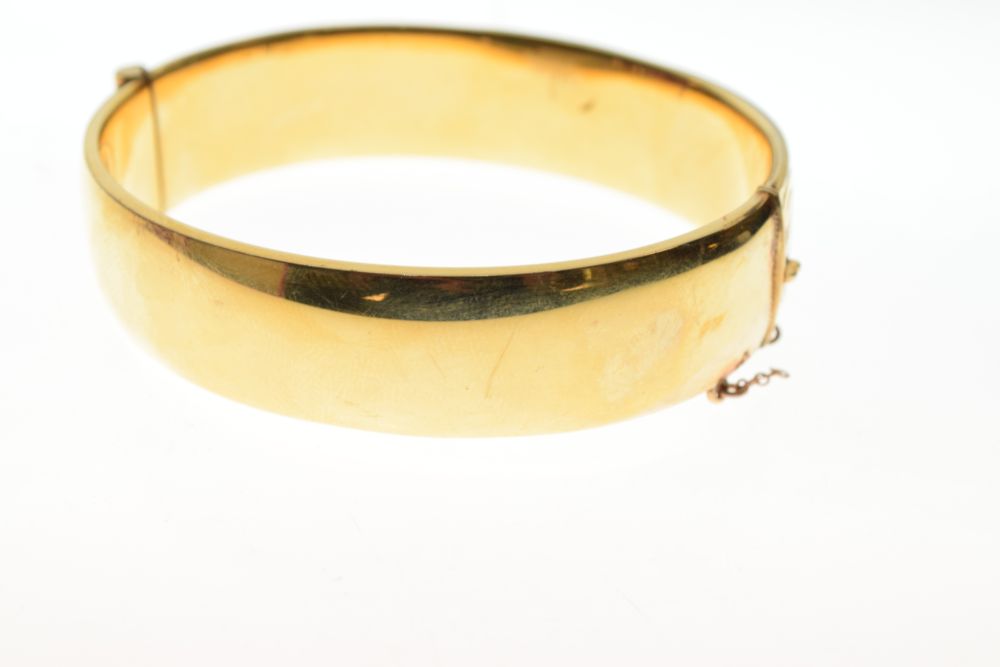 Yellow metal snap bangle, stamped 9ct metal core, 16mm wide, 30.7g gross approx Condition: ** Due to - Image 4 of 7