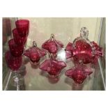 Quantity of cranberry glass baskets, together with four wine glasses Condition: One basket having