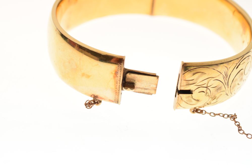 Yellow metal snap bangle, stamped 9ct metal core, 16mm wide, 30.7g gross approx Condition: ** Due to - Image 7 of 7