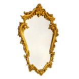 Gilt framed Rococo style mirror, 73cm high Condition: **Due to current lockdown conditions,