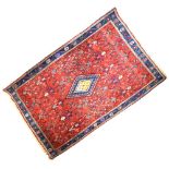 Middle Eastern wool rug, probably North West Persia, the bright red field with all-over boteh, 160cm