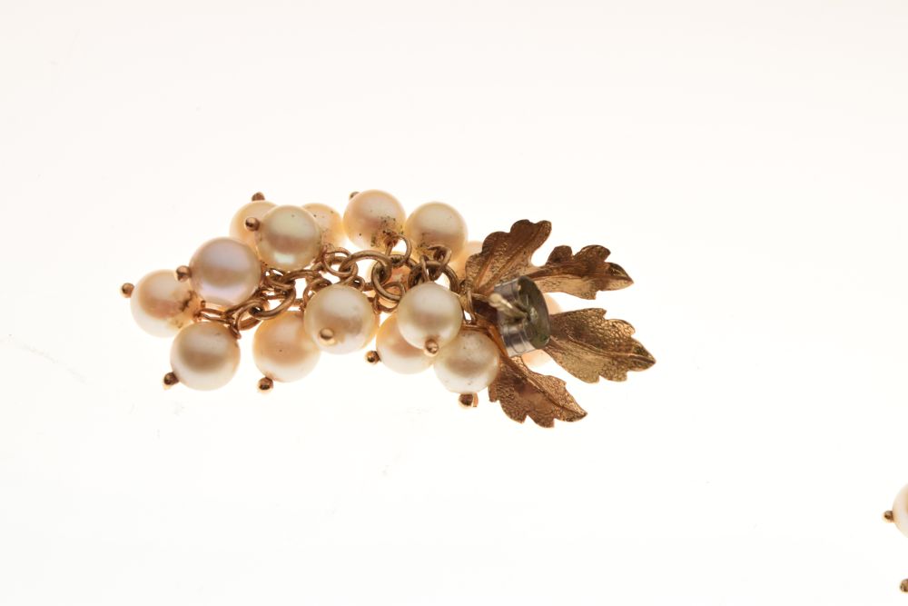 Pair of unmarked yellow metal and cultured pearl ear studs of leaf design, the pearl drops formed as - Image 4 of 5