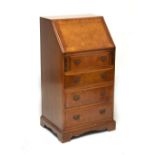 Reproduction mahogany bureau fitted four long drawers, 51cm wide Condition: Some scuffing to the