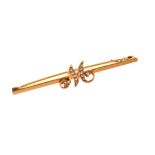 Yellow metal and seed pearl bar brooch with cursive initial M, 5cm wide, 3.3g gross approx