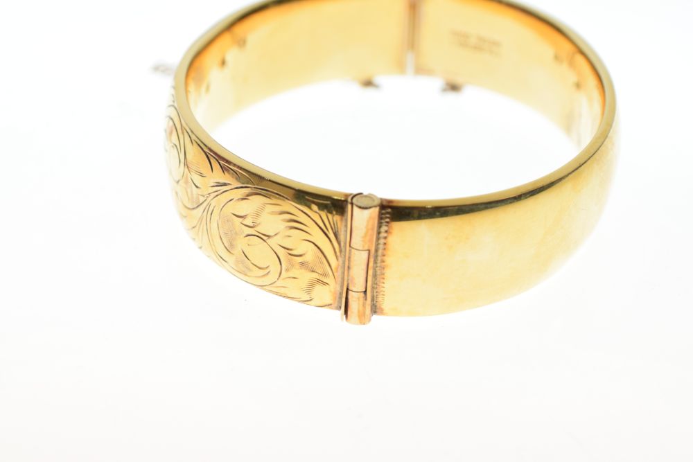 Yellow metal snap bangle, stamped 9ct metal core, 16mm wide, 30.7g gross approx Condition: ** Due to - Image 3 of 7