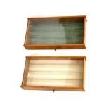 Pair of light ash Perspex fronted wall mounted display shelves, 54cm wide x 28.5cm high x 9cm