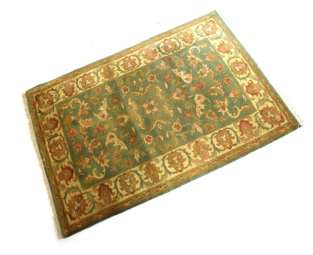 Indian wool rug, 124cm x 180cm Condition: Deep pile and good colour but would benefit from a clean -
