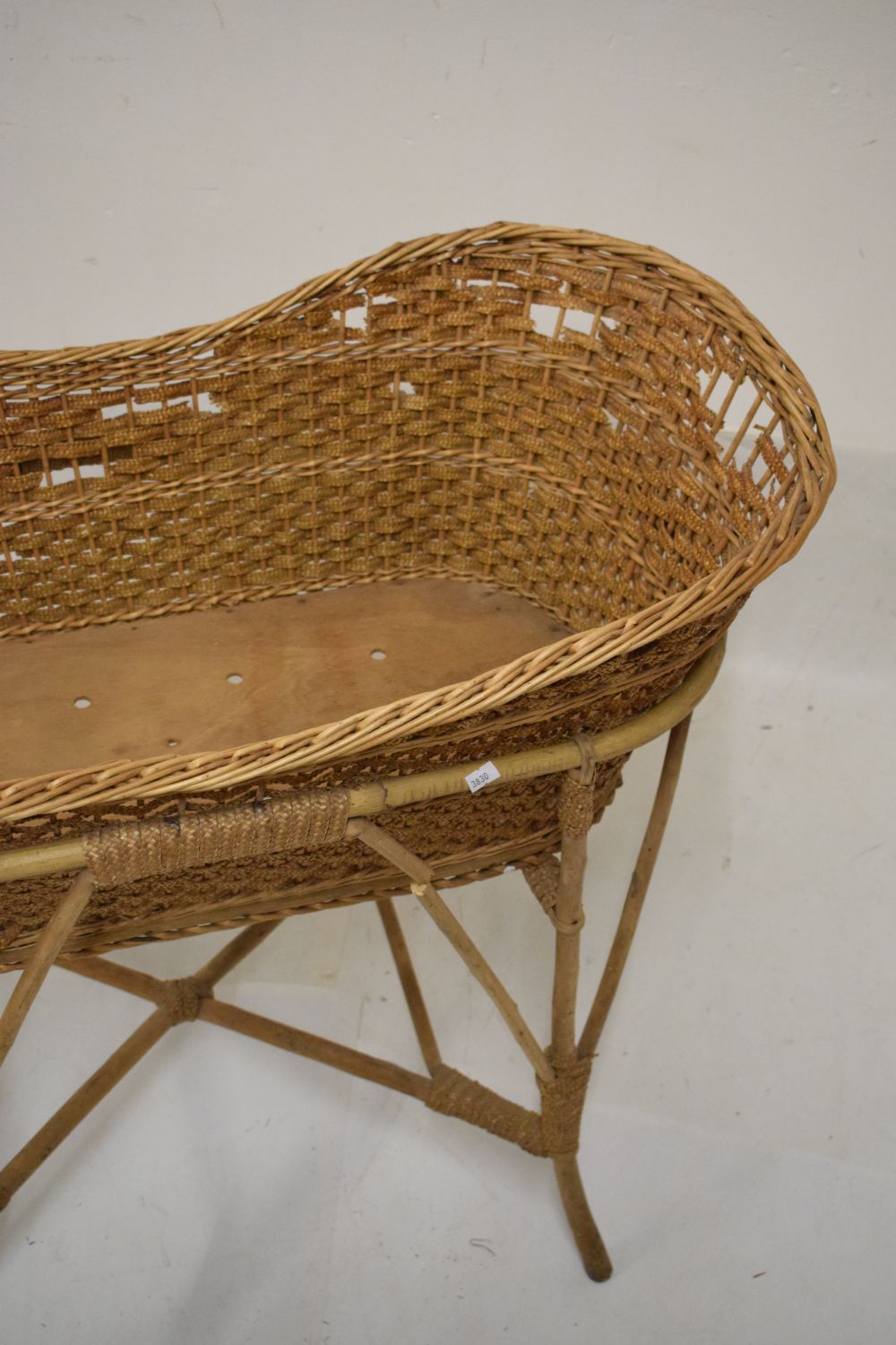 Bamboo and wicker cradle or bassinet, 88cm long x 78cm high Condition: Woodworm to the frame and - Image 4 of 5