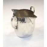 George V silver twin handled cream jug of bulbous form, London 1926, 8cm high, 145g approx